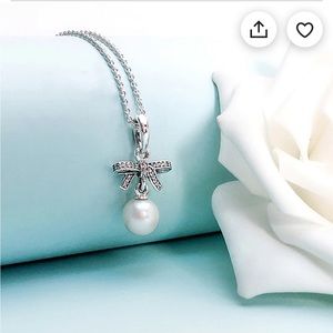 Pandora silver necklace with Pearl and bow
